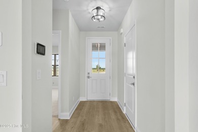 Welcome to The Courtyards by Carrell! This Capri Designer Luxury on Ocean Ridge Plantation in North Carolina - for sale on GolfHomes.com, golf home, golf lot