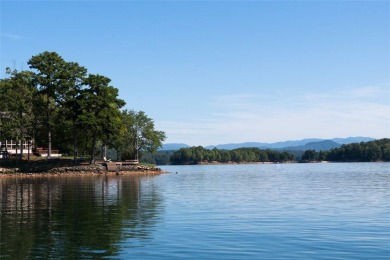 This stunning craftsman-style 4-bedroom home blends modern on Keowee Key Golf and Country Club in South Carolina - for sale on GolfHomes.com, golf home, golf lot