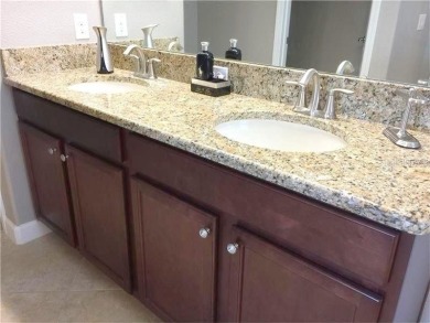 Start living the resort lifestyle in this BEAUTIFUL 3 bedroom 2 on The Oasis Club at Champions Gate in Florida - for sale on GolfHomes.com, golf home, golf lot