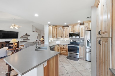 A dream kitchen awaits you in this 1989 SF, 2 bedroom, plus den on Sunland Springs Golf Course  in Arizona - for sale on GolfHomes.com, golf home, golf lot