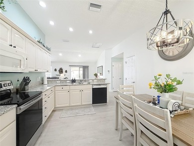 **MOVE IN READY** CUSTOM DESIGNED HOME with $64,000 in UPGRADES on Nancy Lopez Legacy Golf and Country Club in Florida - for sale on GolfHomes.com, golf home, golf lot