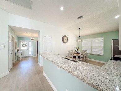 **MOVE IN READY** CUSTOM DESIGNED HOME with $64,000 in UPGRADES on Nancy Lopez Legacy Golf and Country Club in Florida - for sale on GolfHomes.com, golf home, golf lot