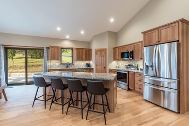 RARE BLACK HILLS GEM! Nearly new, fully-furnished custom home in on Boulder Canyon Country Club in South Dakota - for sale on GolfHomes.com, golf home, golf lot
