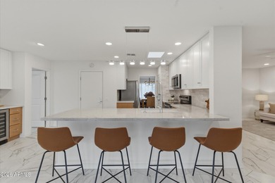 Extensively updated 2025-2026 in PH 3 of Sun City, this move-in on Union Hills Country Club in Arizona - for sale on GolfHomes.com, golf home, golf lot