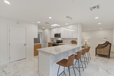 Extensively updated 2025-2026 in PH 3 of Sun City, this move-in on Union Hills Country Club in Arizona - for sale on GolfHomes.com, golf home, golf lot