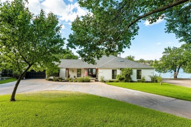 Welcome Home to this picture perfect MAIN BODY WATERFRONT on De Cordova Bend Country Club in Texas - for sale on GolfHomes.com, golf home, golf lot