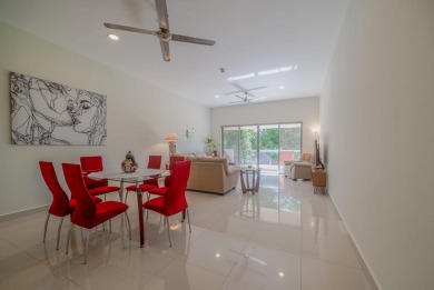 Experience luxury living in Puerto Aventuras with this beautiful on Club De Golf Puerto Aventuras in  - for sale on GolfHomes.com, golf home, golf lot