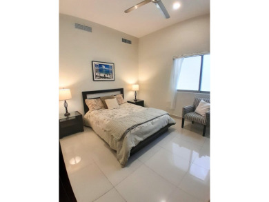 Experience luxury living in Puerto Aventuras with this beautiful on Club De Golf Puerto Aventuras in  - for sale on GolfHomes.com, golf home, golf lot