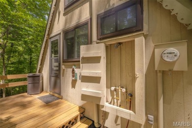Close to the beach AND tucked away on 3.67 acres this adorable on Innsbrook Resort Golf Course in Missouri - for sale on GolfHomes.com, golf home, golf lot