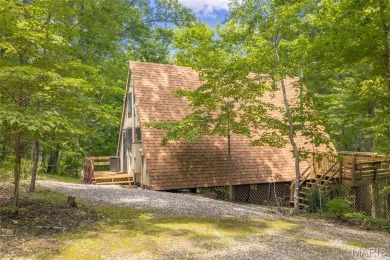 Close to the beach AND tucked away on 3.67 acres this adorable on Innsbrook Resort Golf Course in Missouri - for sale on GolfHomes.com, golf home, golf lot