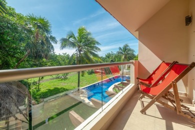 Experience luxury living in Puerto Aventuras with this beautiful on Club De Golf Puerto Aventuras in  - for sale on GolfHomes.com, golf home, golf lot