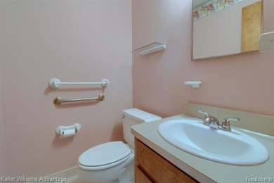 Welcome to this classic colonial in the highly regarded Glenview on Hilltop Golf Course in Michigan - for sale on GolfHomes.com, golf home, golf lot