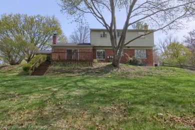 Welcome to this classic colonial in the highly regarded Glenview on Hilltop Golf Course in Michigan - for sale on GolfHomes.com, golf home, golf lot