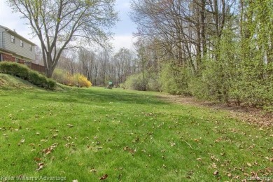 Welcome to this classic colonial in the highly regarded Glenview on Hilltop Golf Course in Michigan - for sale on GolfHomes.com, golf home, golf lot
