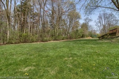 Welcome to this classic colonial in the highly regarded Glenview on Hilltop Golf Course in Michigan - for sale on GolfHomes.com, golf home, golf lot