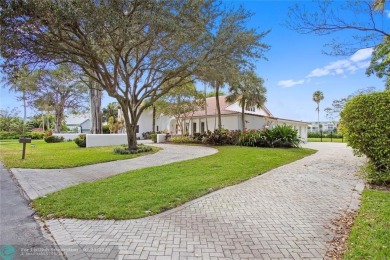 Exceptional turnkey 4 bedrooms/6.5 bathrooms home in Palm Aire on Oaks Country Club in Florida - for sale on GolfHomes.com, golf home, golf lot