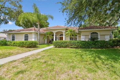 Stunning 4-bedroom, 3-bath pool home with spa on a serene pond on Crescent Oaks Country Club in Florida - for sale on GolfHomes.com, golf home, golf lot