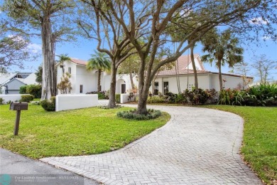 Exceptional turnkey 4 bedrooms/6.5 bathrooms home in Palm Aire on Oaks Country Club in Florida - for sale on GolfHomes.com, golf home, golf lot