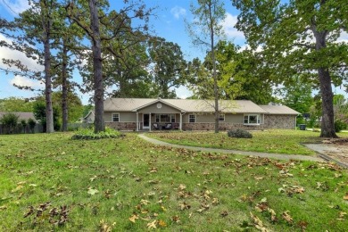 Enjoy a peaceful, park-like setting in this conveniently located on Harrison Country Club in Arkansas - for sale on GolfHomes.com, golf home, golf lot