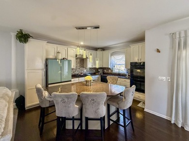 Largest River Bend end-unit townhome with 3 levels of living on River Bend Golf Club in Illinois - for sale on GolfHomes.com, golf home, golf lot