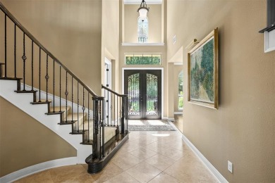 This isn't just a home - it's a lifestyle upgrade.  Step inside on University of Texas Golf Club in Texas - for sale on GolfHomes.com, golf home, golf lot