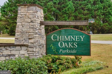 Welcome to this stunning 5-bedroom, 4-bathroom home nestled on on Chimney Oaks Golf Club in Georgia - for sale on GolfHomes.com, golf home, golf lot