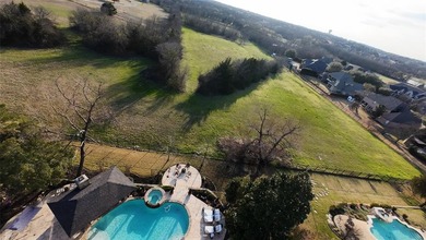 Welcome to 1919 Kings Pass, Heath, Texas 75032 -- a breathtaking on Buffalo Creek Golf Club in Texas - for sale on GolfHomes.com, golf home, golf lot