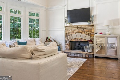 Privately tucked behind a long, tree-lined driveway and greeted on Chateau Elan Golf Club  in Georgia - for sale on GolfHomes.com, golf home, golf lot