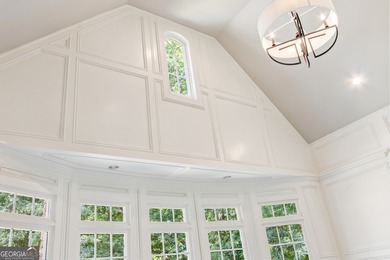 Privately tucked behind a long, tree-lined driveway and greeted on Chateau Elan Golf Club  in Georgia - for sale on GolfHomes.com, golf home, golf lot