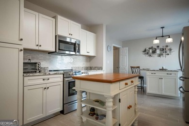 Enjoy low-maintenance living in a beautiful golf course setting on Jennings Mill Country Club in Georgia - for sale on GolfHomes.com, golf home, golf lot