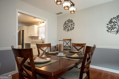 Enjoy low-maintenance living in a beautiful golf course setting on Jennings Mill Country Club in Georgia - for sale on GolfHomes.com, golf home, golf lot