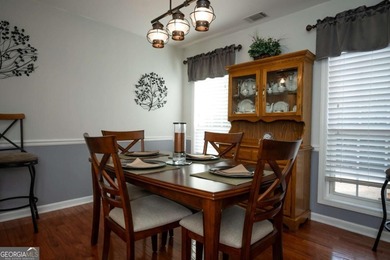 Enjoy low-maintenance living in a beautiful golf course setting on Jennings Mill Country Club in Georgia - for sale on GolfHomes.com, golf home, golf lot