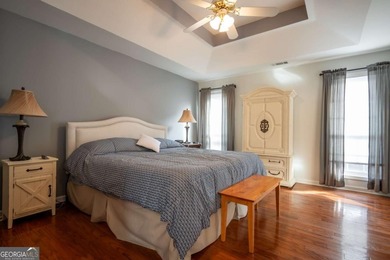 Enjoy low-maintenance living in a beautiful golf course setting on Jennings Mill Country Club in Georgia - for sale on GolfHomes.com, golf home, golf lot