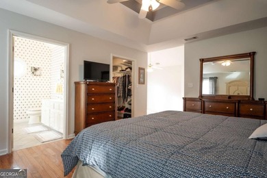 Enjoy low-maintenance living in a beautiful golf course setting on Jennings Mill Country Club in Georgia - for sale on GolfHomes.com, golf home, golf lot