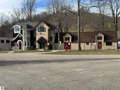 Welcome to an exceptional retreat at Schuss Mountain! This rare on Schuss Mountain Golf Club in Michigan - for sale on GolfHomes.com, golf home, golf lot