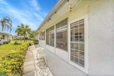 IMMACULATE 2 bed 2 bath VILLA features light-filled, OPEN floor on Cypress Lakes Golf Course - West Palm Beach in Florida - for sale on GolfHomes.com, golf home, golf lot