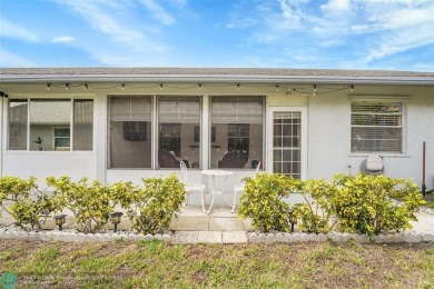 IMMACULATE 2 bed 2 bath VILLA features light-filled, OPEN floor on Cypress Lakes Golf Course - West Palm Beach in Florida - for sale on GolfHomes.com, golf home, golf lot