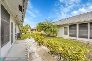 IMMACULATE 2 bed 2 bath VILLA features light-filled, OPEN floor on Cypress Lakes Golf Course - West Palm Beach in Florida - for sale on GolfHomes.com, golf home, golf lot