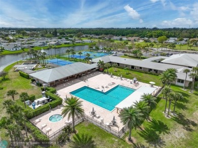 IMMACULATE 2 bed 2 bath VILLA features light-filled, OPEN floor on Cypress Lakes Golf Course - West Palm Beach in Florida - for sale on GolfHomes.com, golf home, golf lot