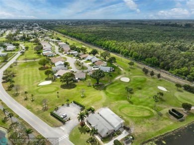 IMMACULATE 2 bed 2 bath VILLA features light-filled, OPEN floor on Cypress Lakes Golf Course - West Palm Beach in Florida - for sale on GolfHomes.com, golf home, golf lot