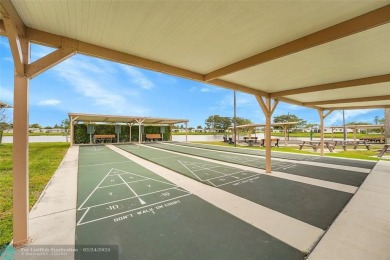 IMMACULATE 2 bed 2 bath VILLA features light-filled, OPEN floor on Cypress Lakes Golf Course - West Palm Beach in Florida - for sale on GolfHomes.com, golf home, golf lot