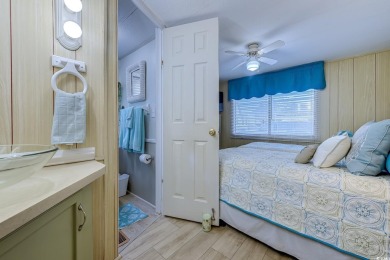 Fully Furnished 3BD 2BA manufactured home situated on one of the on Barefoot Resort and Golf Club  in South Carolina - for sale on GolfHomes.com, golf home, golf lot