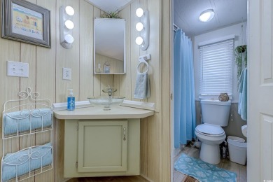 Fully Furnished 3BD 2BA manufactured home situated on one of the on Barefoot Resort and Golf Club  in South Carolina - for sale on GolfHomes.com, golf home, golf lot