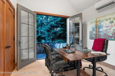 Impeccably updated and artfully crafted, this stunning River on River Valley Ranch Golf Club in Colorado - for sale on GolfHomes.com, golf home, golf lot