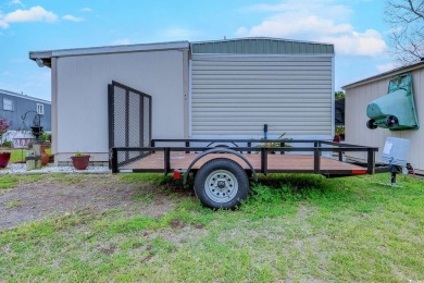 Fully Furnished 3BD 2BA manufactured home situated on one of the on Barefoot Resort and Golf Club  in South Carolina - for sale on GolfHomes.com, golf home, golf lot