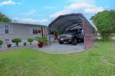 Fully Furnished 3BD 2BA manufactured home situated on one of the on Barefoot Resort and Golf Club  in South Carolina - for sale on GolfHomes.com, golf home, golf lot