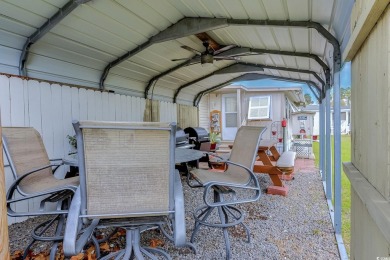 Fully Furnished 3BD 2BA manufactured home situated on one of the on Barefoot Resort and Golf Club  in South Carolina - for sale on GolfHomes.com, golf home, golf lot