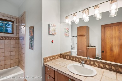 Impeccably updated and artfully crafted, this stunning River on River Valley Ranch Golf Club in Colorado - for sale on GolfHomes.com, golf home, golf lot