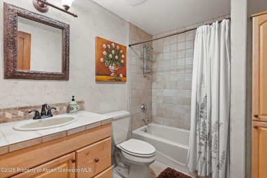 Impeccably updated and artfully crafted, this stunning River on River Valley Ranch Golf Club in Colorado - for sale on GolfHomes.com, golf home, golf lot