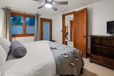 Impeccably updated and artfully crafted, this stunning River on River Valley Ranch Golf Club in Colorado - for sale on GolfHomes.com, golf home, golf lot